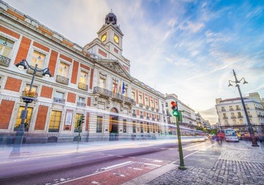 the puerta del sol square is the main public square in the city of madrid, spain. in the middle of the square is located the office of the president of the community of madrid.