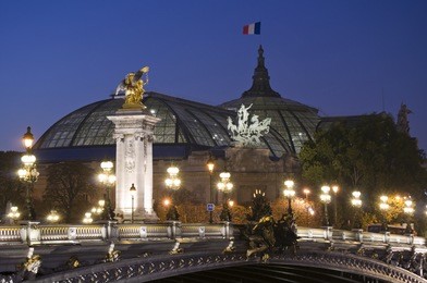 pont alexandre iii with the grand palais in the background at dusk