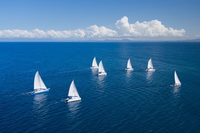 regatta in indian ocean, sailboat and catamaran. helicopter view