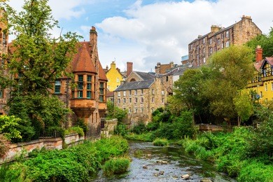 picturesque dean village along the river leith in edinburgh, scotland