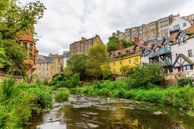 picturesque dean village along the river leith in edinburgh, scotland