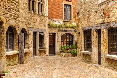 stone house of perouges, france, a medieval walled town, a popular touristic attraction.
