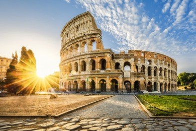 colosseum in rome and morning sun, italy, europe.
