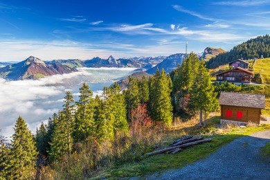 fog surrounding grosser, kleiner mythen, lake lucerne, rigi mountain, brunnen city and weggis village from klewenalp swiss alps, central switzerland