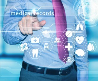 man working with medical records