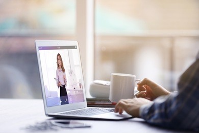 man video conferencing on laptop. webinar and consultation online. modern business technology concept.