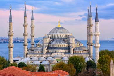 minarets and domes of blue mosque with bosporus and marmara sea in background, istanbul, turkey
