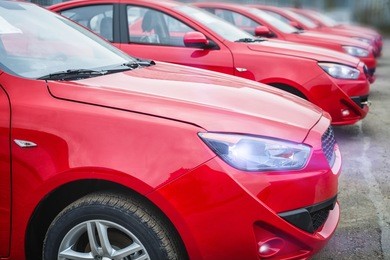 many red car with a small depth of field