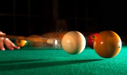 action shot billiards table pool cue and balls