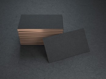 black and gold blank business cards mockup on black background, 3d rendering