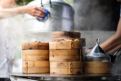 close up dim sum in bamboo steamer,yumcha of chinese cuisine with blurry background