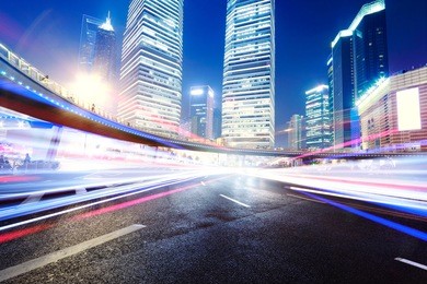 the light trails on the modern building background in shanghai china.