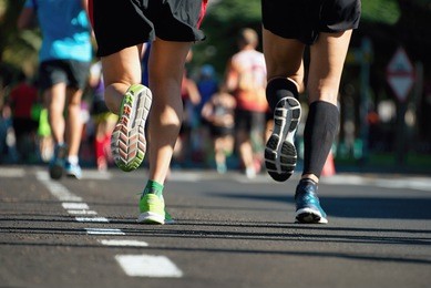 marathon running race, people feet on city road