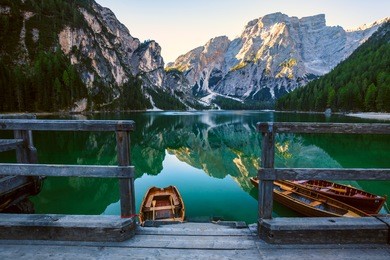 boats on the braies lake ( pragser wildsee ) in dolomites mountains, sudtirol, italy