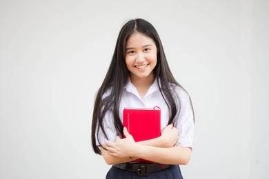asia thai high school student uniform beautiful girl read a book