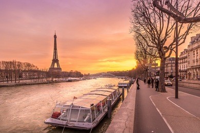 boat waiting for the seine river cruise in the shed of the eiffel tower, paris, france