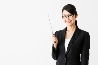 portrait of asian businesswoman pointing isolated on white background