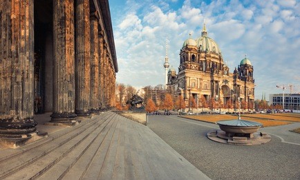 berlin cathedral, or berliner dom on a bright afternoon in fall from the steps of altes museum. this image is toned.
