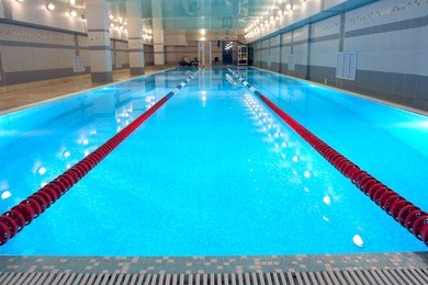 the view of a swimming pool indoors