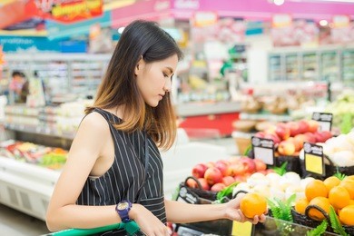 happy woman  shopping at the supermarket