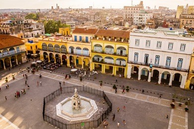 view of plaza vieja in havana, cuba from above with colorful colonial buildings