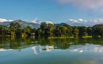 fewa lake and the annapurna range in pokhara, nepal