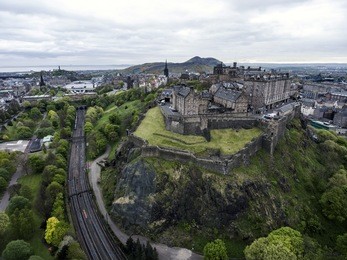 edinburgh city the historic castle on rock cloudy day aerial shot 5