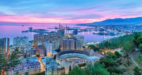 sunset in malaga - aerial view, costa del sol, andalusia, spain