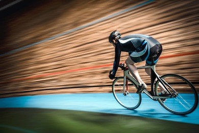 racing cyclist on velodrome