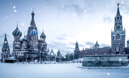 christmas time in moscow - snow falling on red square