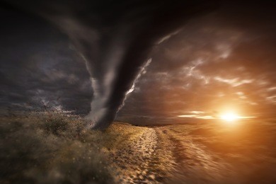 view of a large tornados destroying the landscape