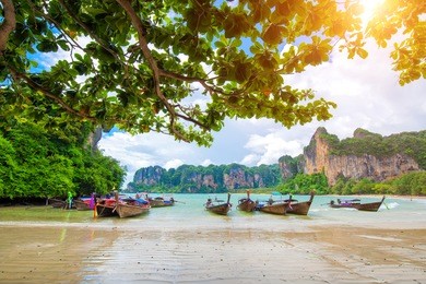 boat on railay beach in krabi thailand. asia 