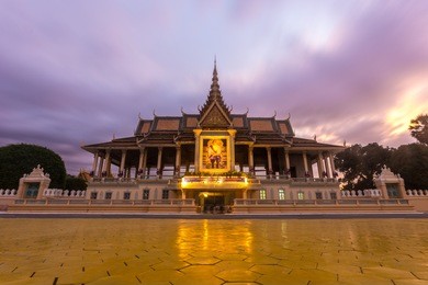 phnom penh tourist attraction and famouse landmark - royal palace complex on sunset, cambodia