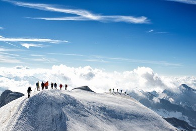 climbers climbing the mountain with mountain equipment, high mountain activity