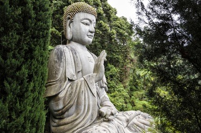 large stone buddha statue at chin swee caves temple, genting highland, malaysia