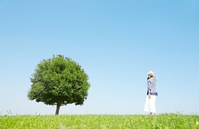 asian woman walking in the park