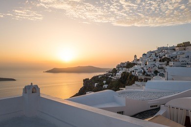 greece, santorini island, imerovigli, panorama of the village at sunset