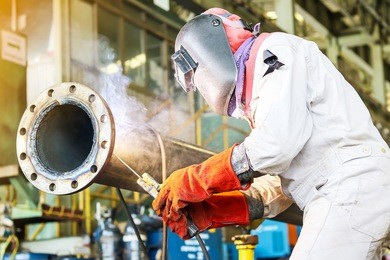 welder industrial automotive part in factory, welding man work in work shop.