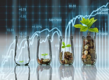 gold coins and seed in clear bottle on stock market exchange data on led display background, business investment growth and trading concept