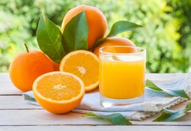 fresh orange juice with  oranges fruit outdoors
