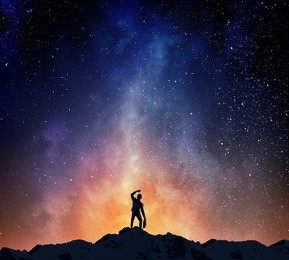 businessman against starry sky . mixed media