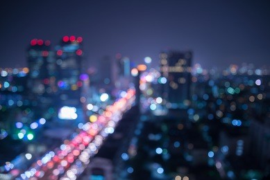 abstract urban city night light bokeh , defocused background