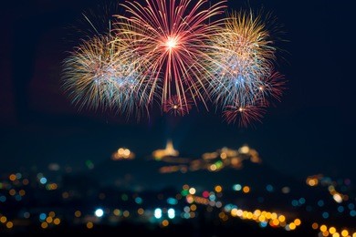 beautiful firework display for celebration with blur bokeh light 