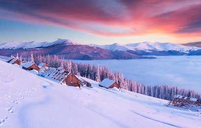 few minutes before sunrise in abandoned carpathian village. colorful winter morning in the mountains. artistic style post processed photo.