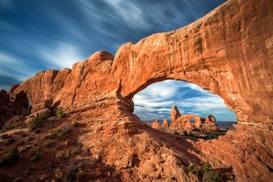 view of turret arch from the north window in arches national park, utah, usa at sunrise