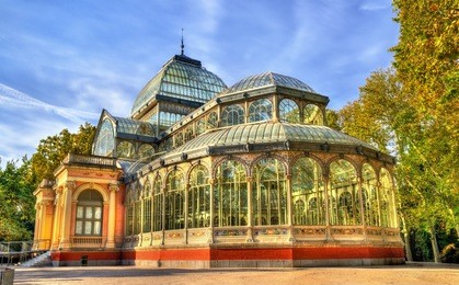 the palacio de cristal in buen retiro park - madrid, spain