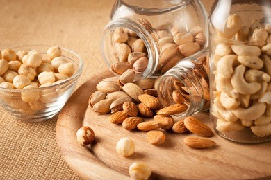 mix of nuts on a wooden table