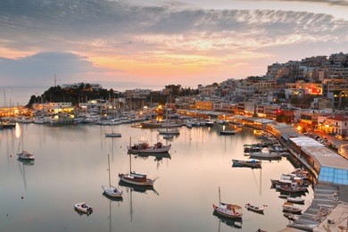 evening view of mikrolimano marina in athens, greece.