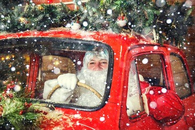 portrait of santa claus. santa claus is driving a car. selective focus.