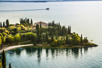 a beautiful sunset over the lake garda. italy